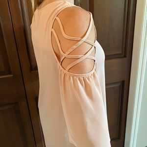 Adorable criss-cross cold shoulder top